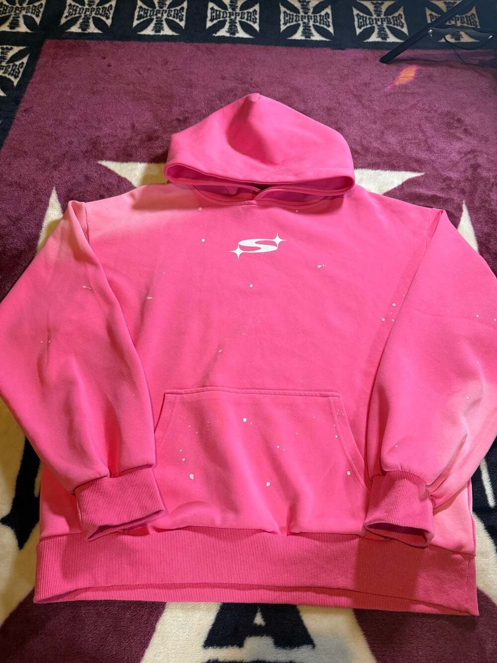 Pink Hoodie with White Logo and Paint Splatter